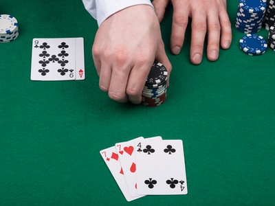 card table bets showing cards, chips and the player's hands
