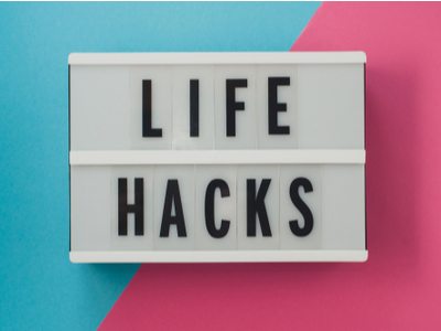 sign with “Life Hacks” written on it